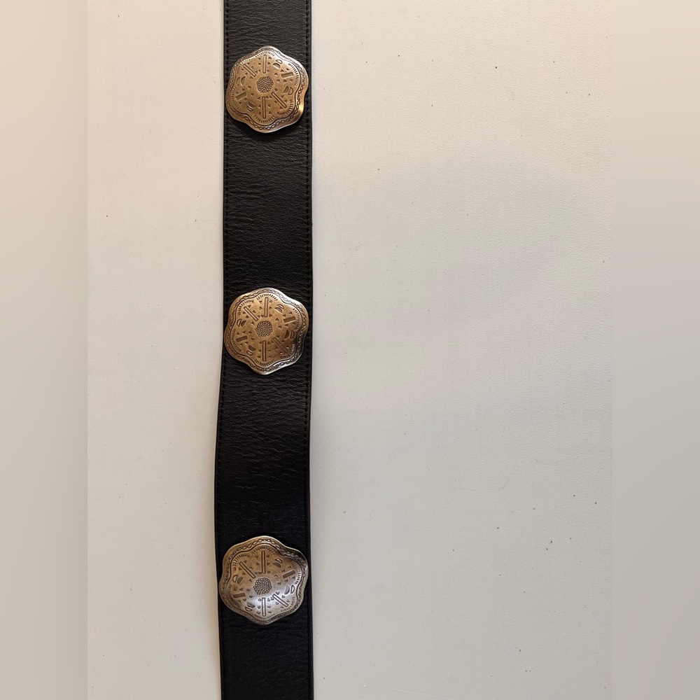 Leather concho belt.